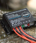 20A 12V 24V IP68 Waterproof PWM Solar Charge Controller on wet stone surface