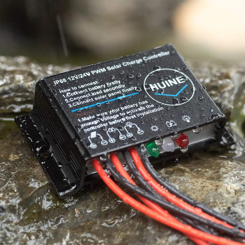 20A 12V 24V IP68 Waterproof PWM Solar Charge Controller on wet stone surface
