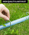 Using Heavy Duty 6 Inch U-Shaped Landscape Staples Set, 120 Pack, 11 Gauge Galvanized Steel Garden Stakes to secure fabric on grass