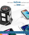 Beefy Power Strip Tower With Eight Outlets And Four USB Ports 3000W 15A Heavy Duty charging multiple devices on desk