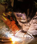 Welder using Welding Heat Resistant Safety Gloves With HeatHide Leather Model 5051 during a project, sparks visible