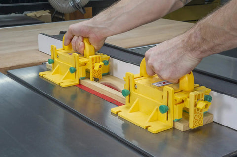 Kickback Buster 3D Push Block With Gravity Heel Kit For Table Saws in use, holding lumber on a table saw with precision.