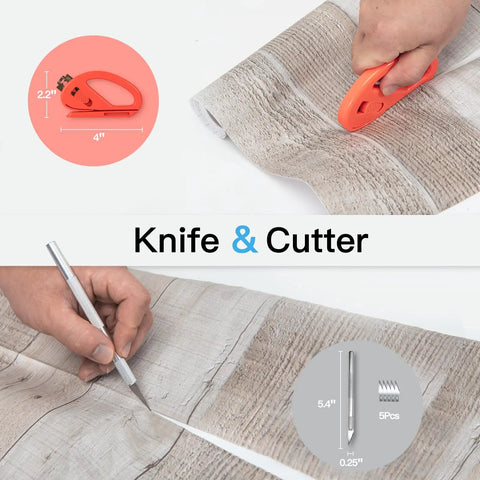 Top view of Peel And Stick Wallpaper Backsplash Application Tool Smoothing Kit With Light Yellow And Blue Squeegees And Craft Knife Blades, showing a hand using a craft knife on wood-pattern wallpaper.