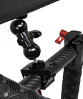 Close-up of Beefed Up 360 Degree Rotating Monitor Mount and Clamp for 25mm Round Rods attached to stabilizer, showing tilt mechanism.