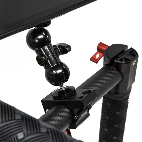 Close-up of Beefed Up 360 Degree Rotating Monitor Mount and Clamp for 25mm Round Rods attached to stabilizer, showing tilt mechanism.