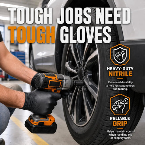Heavy Duty 7 Mil Black Nitrile Disposable Gloves For Mechanics Built Different Rock Solid Puncture Resistance And Dang Good Grip Packaged In A Slick Dispenser Box, worn while using a power tool on a car tire.
