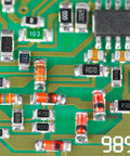 Close-up of a 2512 Surface Mount Chip Resistor Kit Twenty Piece 100 Ohm One Percent Tolerance One Watt Ceramic Resistors on a PCB