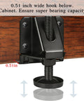 Close-up of Heavy Duty Adjustable Leveling Feet 4 Pack Black Furniture Levelers With Hex Key Adjustment installed under cabinet.