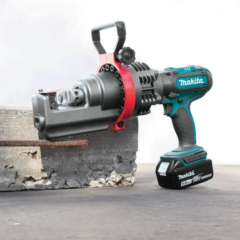 Makita Xcs01t1 18V Lxt Lithium Ion Cordless Rebar Cutter Kit with rotating head cutting rebar in concrete block.