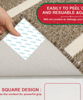 12 Piece Rug Pad Gripper Set For Hardwood Floors With Non Slip Pads showing corner lifting to reveal reusable carpet tape anchor