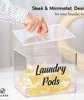 Person lifting lid of Premium Acrylic Laundry Pods Container With Lid Clear Pod Holder For Tide Pods And Detergent Capsules Storage Dispenser Jar For Easy Laundry Room Organization And Decor
