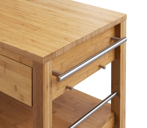 Total Kitchen Upgrade 48 Inch Bamboo Island Cart With Slick Rolling Wheels Double Drawer Units And Spacious Shelves Heavy Duty Wood Prep Table For Hella Easy Home Organization close-up of bamboo top and drawer.
