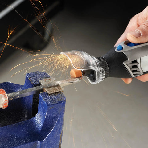 Zero Mess Spark Shield And Accessory Bundle For Rotary Tools Slick Spring Guard deflects sparks during rotary cutting in a vice.