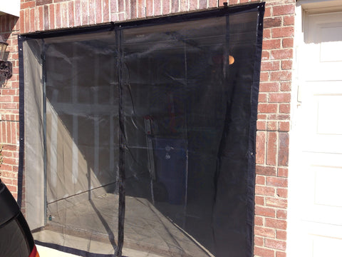 Durable 14 Ft By 7 Ft Garage Screen With Easy Pass Through Zippered Access Storage Kit Included No Hassle Setup on brick wall