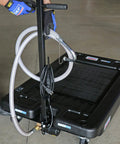 17 Gallon Low Profile Truck Drain With 120V Electric Pump showing handle and discharge hose for easy fluid cleanup.