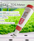 4 In 1 PH TDS EC Meter For Hydroponics And Indoor Gardens Digital Water Tester displayed above hydroponic plants