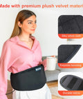 Woman using Plug In Back Heating Pad With Vibration Massager Low Heat And Auto Shut Off Heated Waist Belt for lower back pain relief