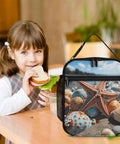 Girl at table with Colorful Starfish Beach Lunch Box Insulated Tote With Side Pocket beside her