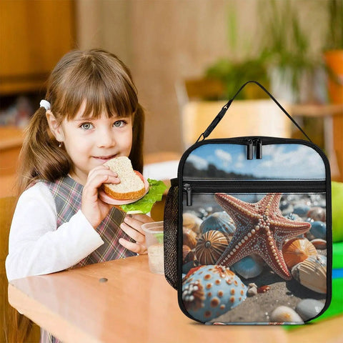 Girl at table with Colorful Starfish Beach Lunch Box Insulated Tote With Side Pocket beside her