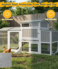 Wooden Chicken Coop on Wheels with Weatherproof Roof and Nesting Box in Backyard