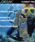 Diver holding waterproof dry bags for phones and small gear airtight underwater pouch that lets you use touch screen.