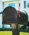 Marshall Locking Mailbox Large Black With Concealed Locking Compartment Rugged Rust Resistant Steel Construction in front of house