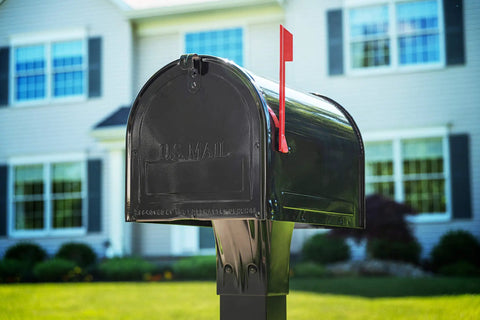Marshall Locking Mailbox Large Black With Concealed Locking Compartment Rugged Rust Resistant Steel Construction in front of house