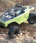 RC car with 1.0 Crawler Tires 58mm Tall 1.0 Inch Mud Slingers Soft Sticky Compound on rocky terrain