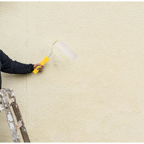 Person using a mini paint roller cover on a creamy wall, showcasing the 10 Pack Mini Paint Roller Covers Plus Replacement Sleeves For Walls, Delivers Smooth As Butter Coverage Without Mess Or Stress.