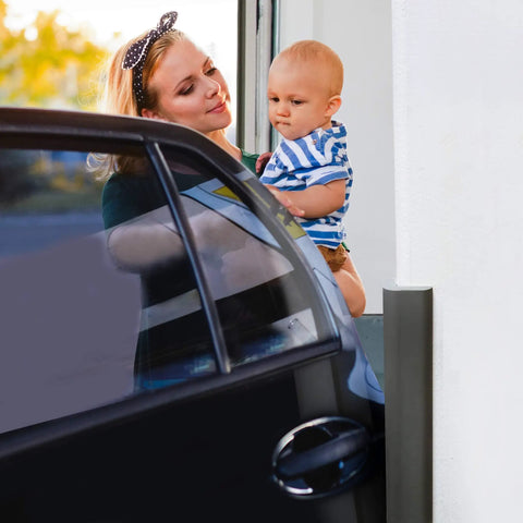 Woman holding baby next to Ultra High Density Tough As Nails Corner Guard Edge Protector And Bumper in parking garage.
