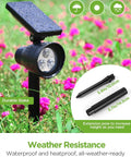 Solar Powered Outdoor Landscape Spotlight Set Of 4 Waterproof Security Lights With Adjustable Angles in garden setting