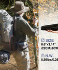 Camper holding packed Ultralight Tent Footprint Tarp 55x87 Inches Waterproof PU2000mm Ground Cloth for Camping and Hiking.