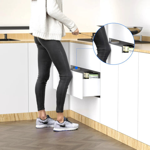 Person demonstrating the Push To Open Cabinet Latch Set 2 Pack Magnetic Touch Latches For Hidden Doors No Knobs Needed Silver Finish.