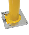 Close-up of Straight Up Heavy Duty Removable Bollard Base Plate Bolted To Concrete with welded steel finish.