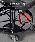 Telescoping Tractor Seat With Parts Tray, 300 Lb Capacity, Adjustable Height 18 To 22 Inches, tools on tray, caster wheels visible