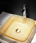 USZWBY Yellow Square Shape Tempered Glass Bathroom Vessel Sink with Waterfall Tap Modern Artistic Vessel Sink with Pop Up Drain, Counter Top Installation, textured gold glass design, overhead view.