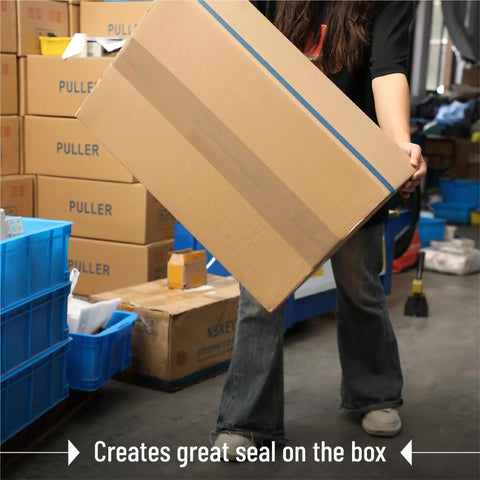 Brown Packing Tape With Dispenser, 2 Inch By 60 Yards, sealing a cardboard box securely in a warehouse setting.