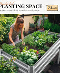 Woman gardening with Heavy Duty Raised Garden Bed With Legs 48 By 24 By 32 Inches Galvanized Elevated Planter Box
