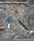 4 Inch Portable Ferro Rod Fire Starter Kit With Striker And Waterproof Case With orange lanyard on grass