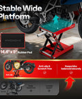 Heavy Duty 1100 Lbs Motorcycle Lift Scissor Jack with wide deck, height adjustable, red steel with crank, holding a bike securely.