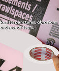 White Vapor Barrier Tape 9 Mil Thick, 3.78-Inch by 60-Yards Waterproof Moisture Barrier With Silicone Adhesive in use on pink insulation