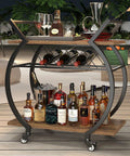 Smooth Rolling Industrial Bar Cart With Spacious Wooden Shelves And Rock Solid Wheels For Your Kitchen Or Lounge Space with bottles and glasses.