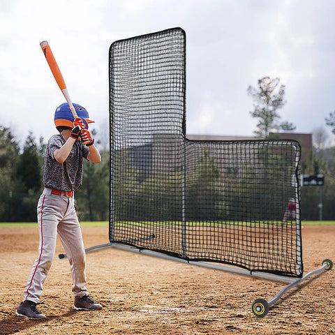 Young baseball player using L Screen Baseball Pitching Net With Wheels, 7x7 Ft Heavy Duty Portable Steel Frame for batting protection