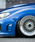 Side view of blue car with JDM Quick Release Fasteners For Car Bumpers Trunk Fender And Hatch Lids Aluminum 6061 T6 Billet Silver 4 Pack
