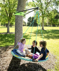 Children playing on Build A Branch Tree Swing Kit Turns Any Healthy 12 to 24 Inch Diameter Tree Into A Secure Outdoor Swing With 360 Degree Swivel