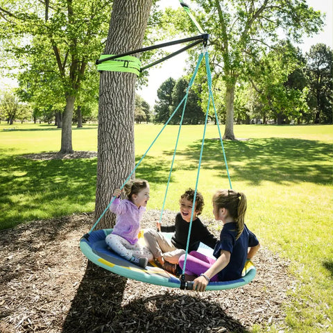 Children playing on Build A Branch Tree Swing Kit Turns Any Healthy 12 to 24 Inch Diameter Tree Into A Secure Outdoor Swing With 360 Degree Swivel