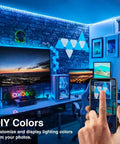 Room with blue-lit WiFi Smart LED Light Strip Kit 65.6ft Non Waterproof 5050 RGB LED Tape and phone app control display.