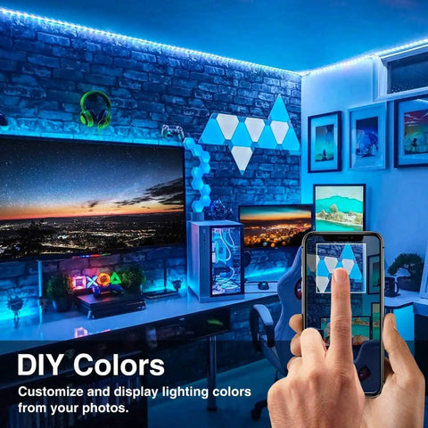 Room with blue-lit WiFi Smart LED Light Strip Kit 65.6ft Non Waterproof 5050 RGB LED Tape and phone app control display.