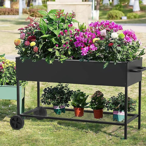 Elevated Garden Bed With Legs And Storage Shelf, Mobile Planter Box For Outdoor Plants, Heavy Duty Metal Raised Garden Bed For Backyard Or Balcony, Anti Rust Coating, Black, 51 By 26 By 31.5 Inches with flowers and pots on grass