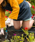 Gardener using Extra Thick Kneeling Pad Black For Knee Pain Relief, Ultra Comfort 1.2 Inch Foam, Waterproof And Dirt Resistant Cushion